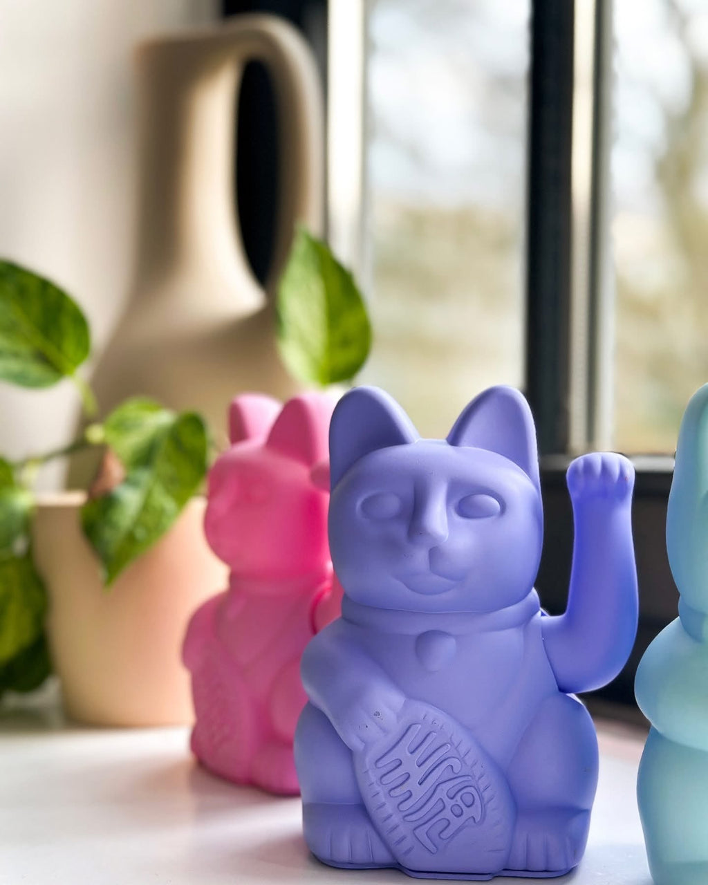 Gatto fortunato rosa brillante