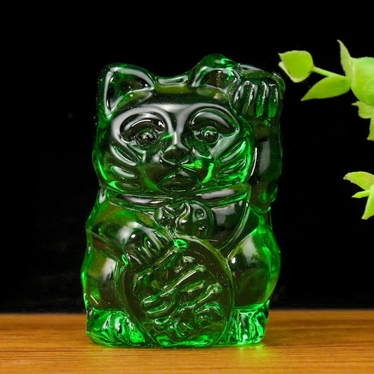 Statuetta verde del gatto portafortuna